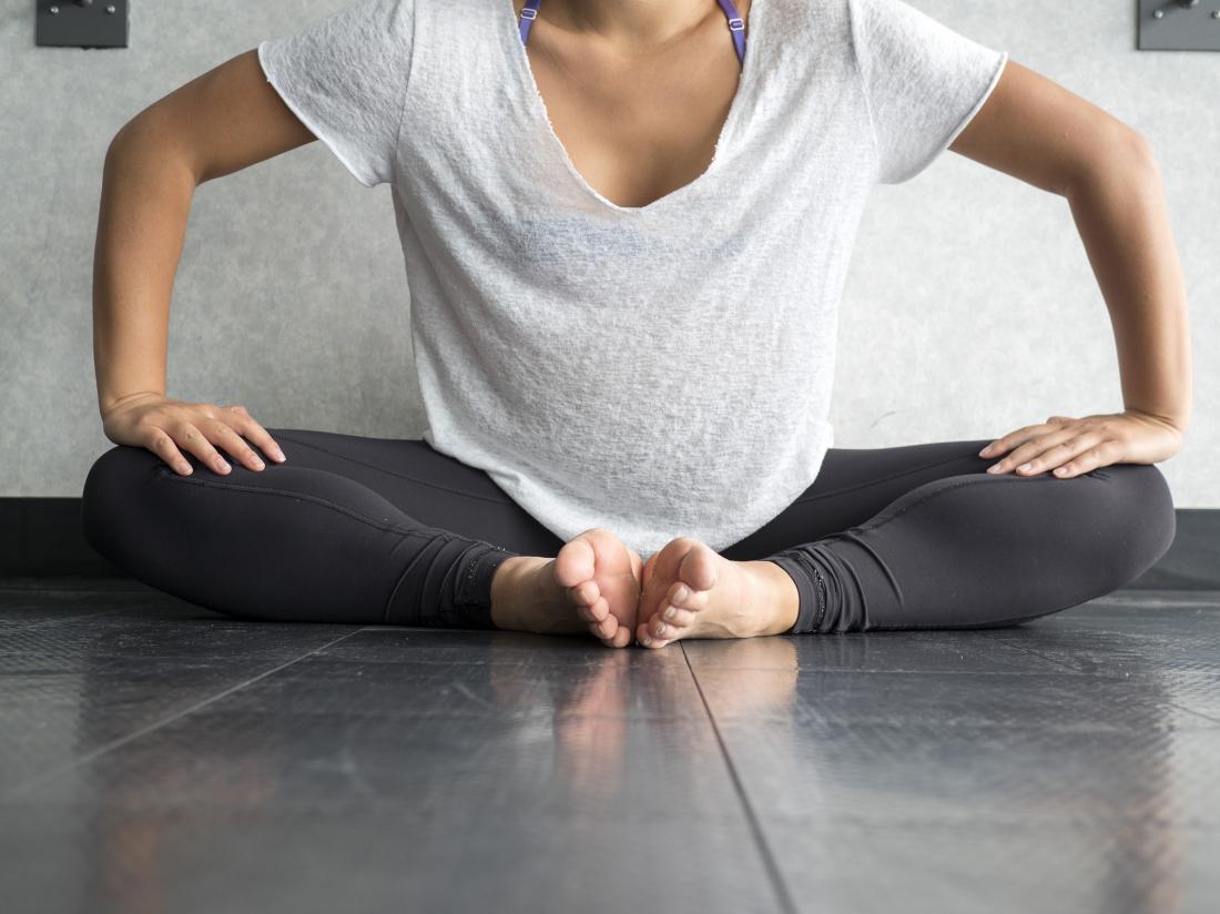 Étirement de rotation externe de la hanche ou pose de yoga.
